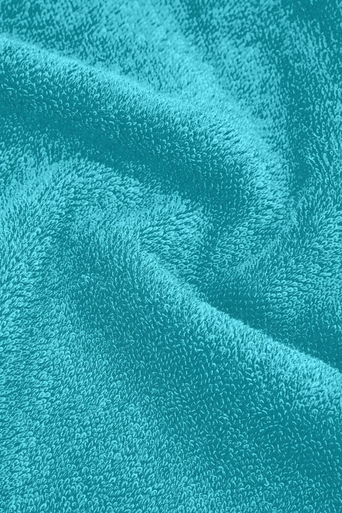 À teneur en TENCEL™ : le lot de 3 serviettes en tissu éponge, TURQUOISE, detail image number 1